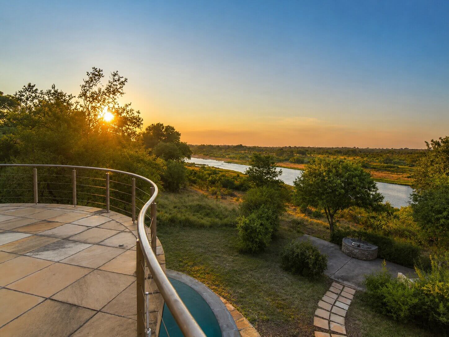 Sunset view over the Crocodile River and surrounding bushveld from Impangele River Lodge.